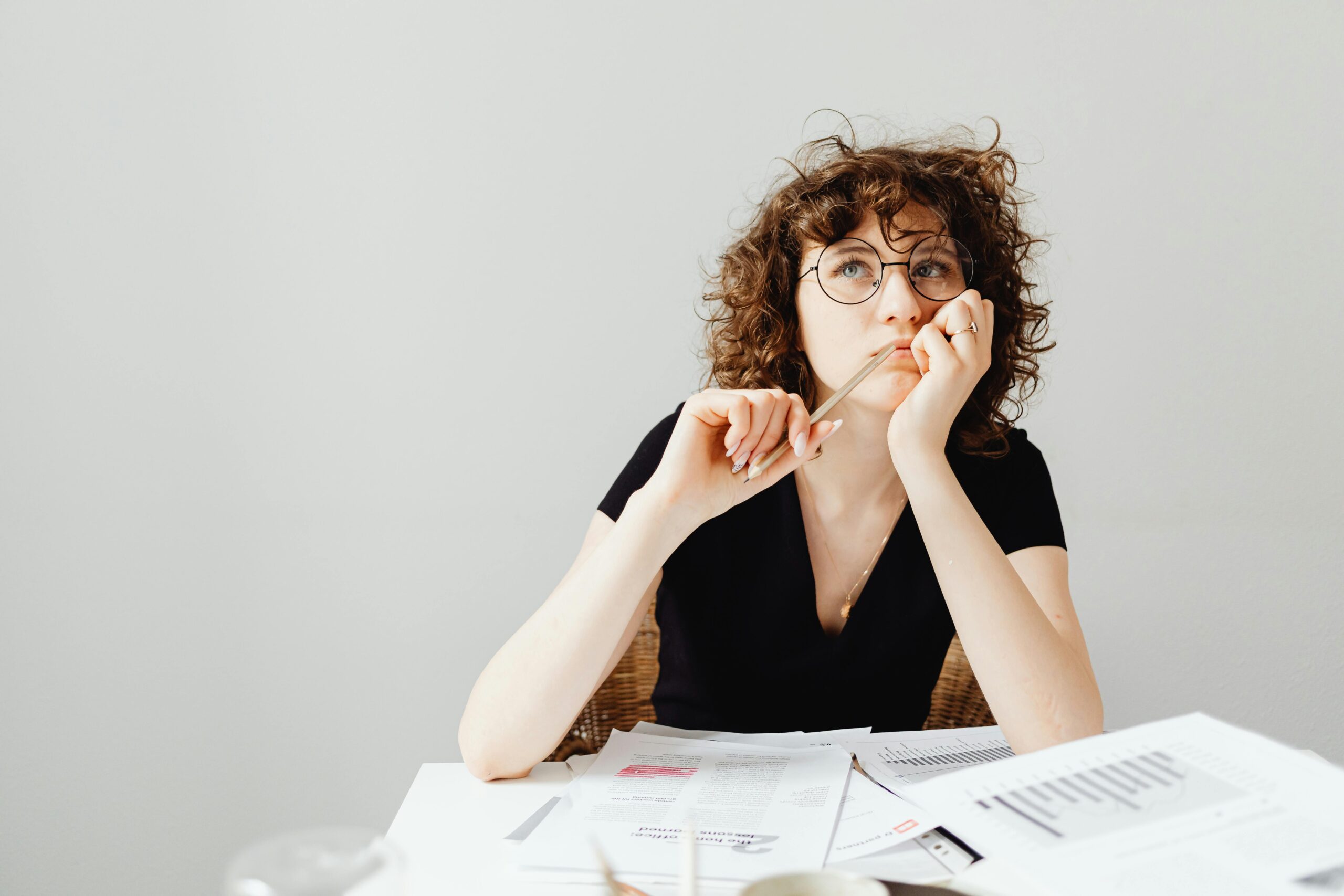 Woman reviewing questions to ask when considering an abortion.